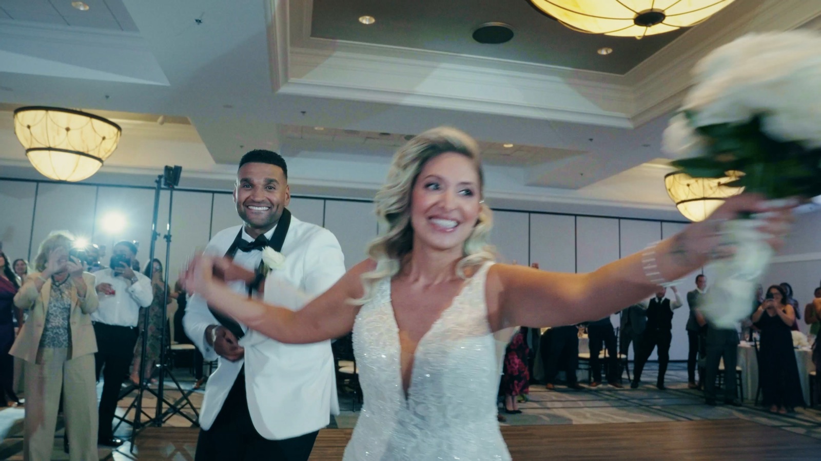 Couple making their grand entrance into the reception